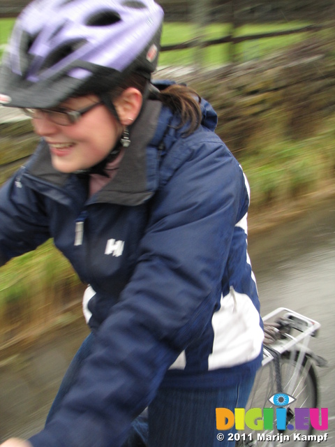 SX17156 Jenni cycling through flooded road